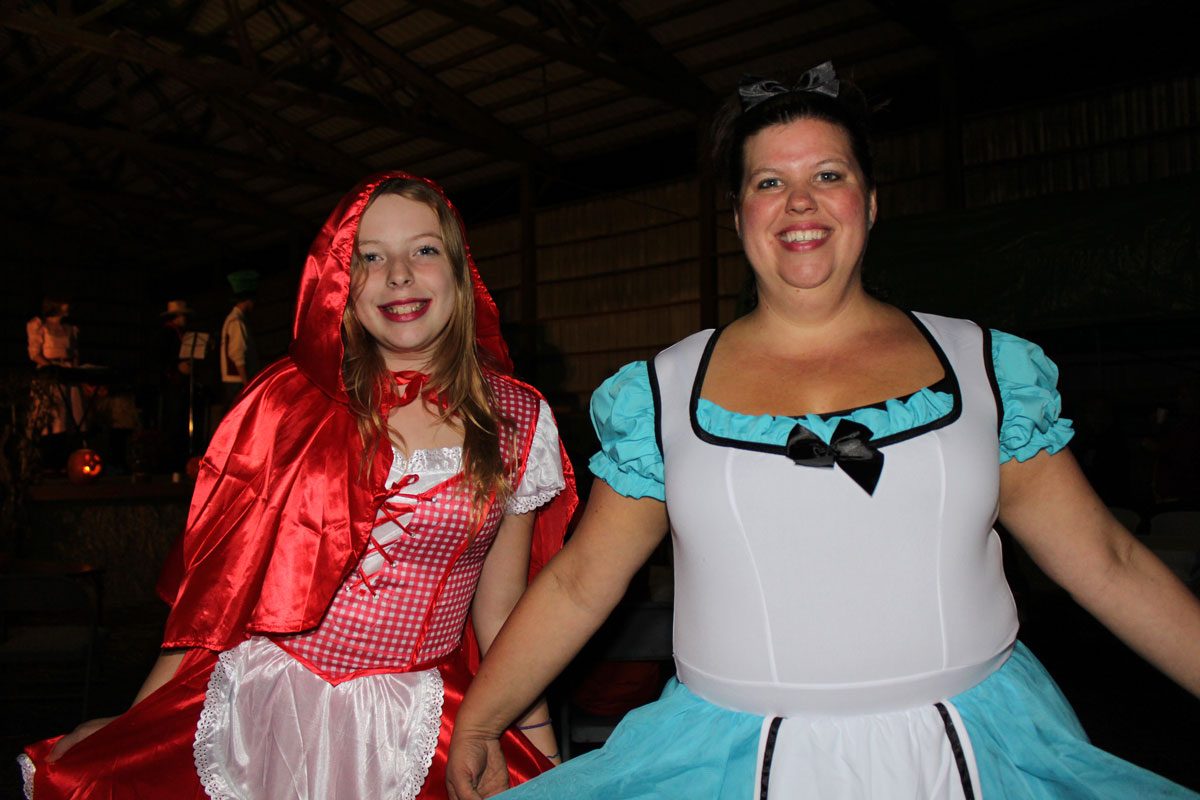 Shannon & Mischel showing off their costumes